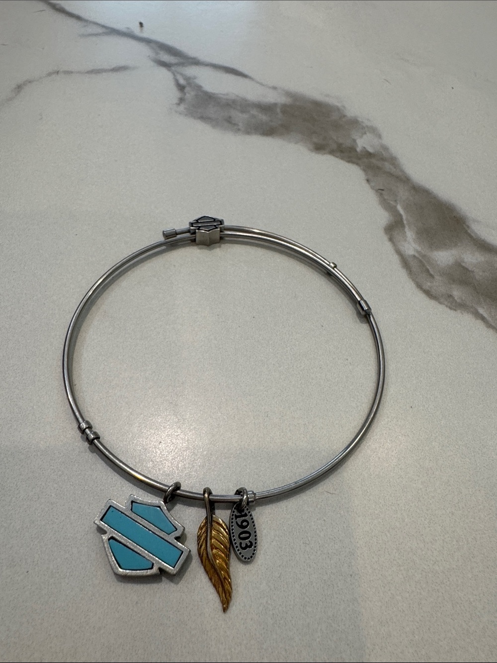 Harley‑Davidson Silver Bangle with Turquoise Shield & Gold Feather